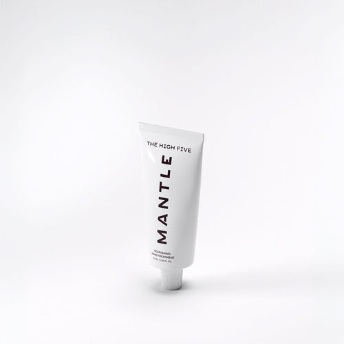 A tube of hand cream with white packaging labeled 'THE HIGH FIVE' by MANTLE.